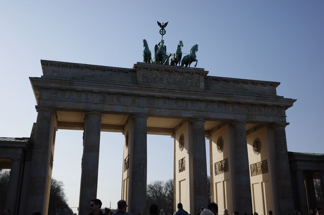 The Brandenburg Gate being hit by beautiful sunlight from the end of the afternoon.
